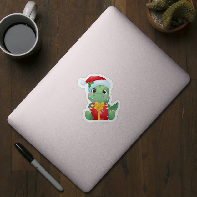 Cute Christmas Dinosaur With Santa Hat Holding A Gift Box by P-ashion Tee